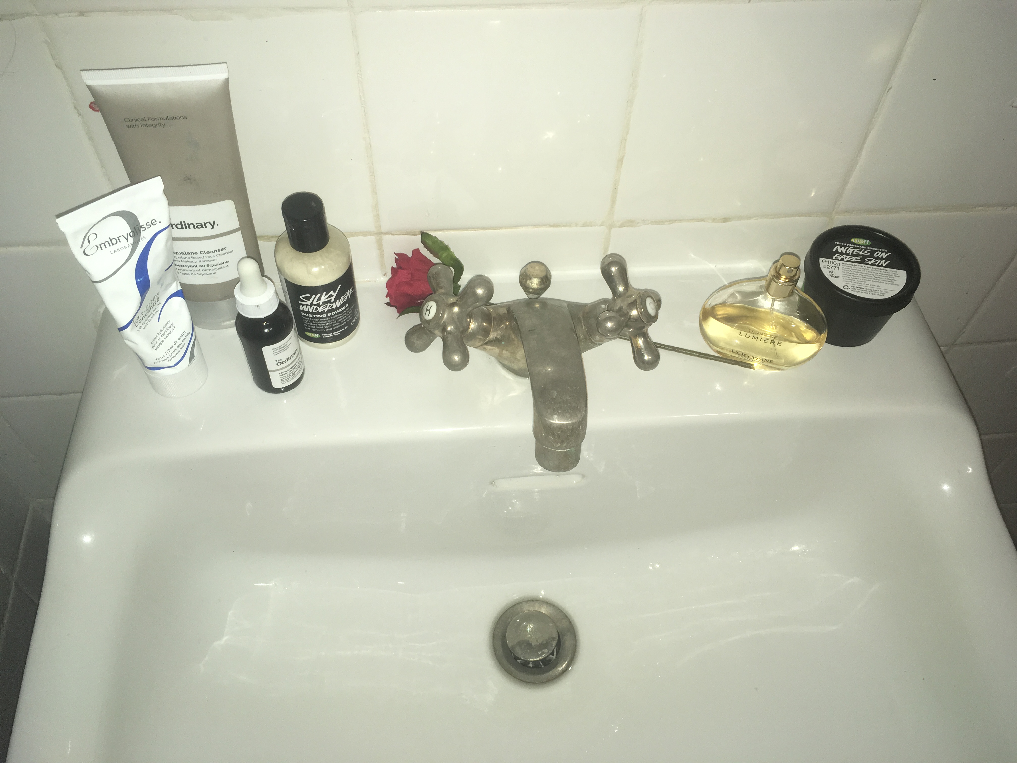 skincare on sink